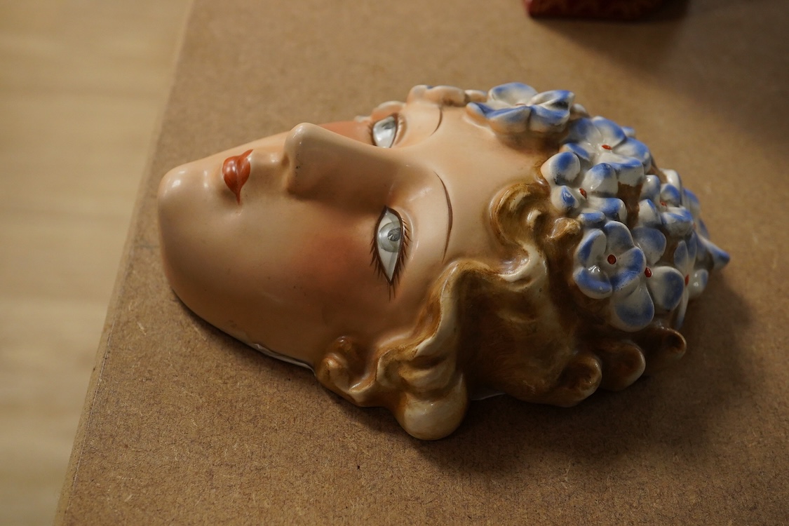 An Art Deco Goebel earthenware wall mask, 16cm high